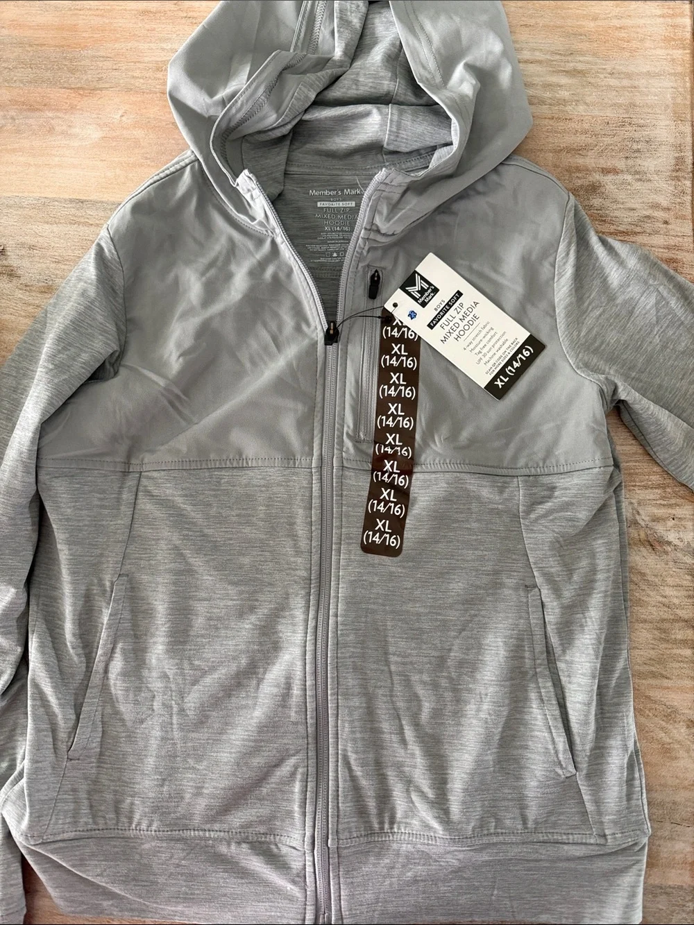 Gray full zip hoodie.